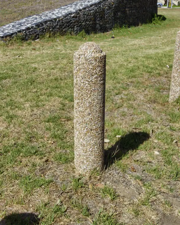Barrier precast concrete bollard with an exposed aggregate finish