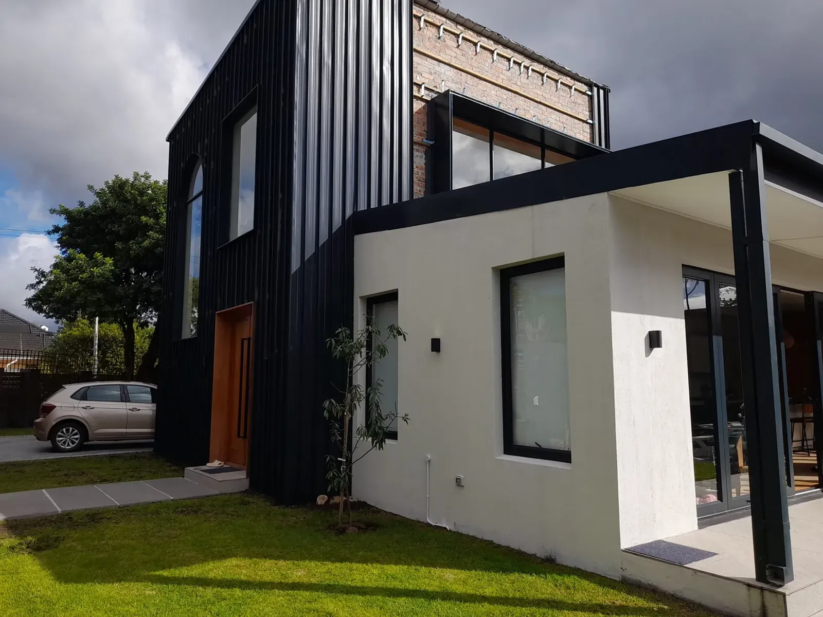 Renovated home exterior completed by 68 Projects Building Co