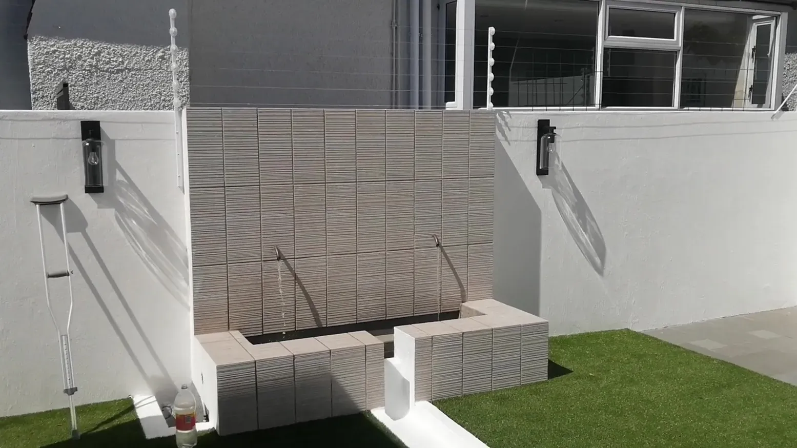 Outdoor terrace and entertainment area built by 68 Projects Building Co