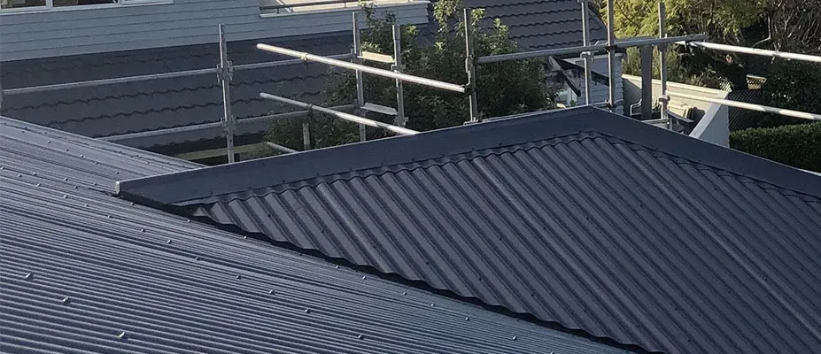 Roofing contractor working on a Cape Town roof