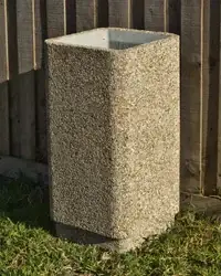Square 400 open-top precast concrete bin with a chamfered cast rim, standing on grass against a timber fence